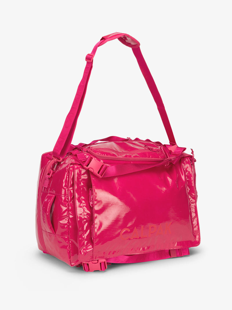 Pink dragonfruit CALPAK terra large 50L duffel backpack with removable and adjustable body shoulder strap