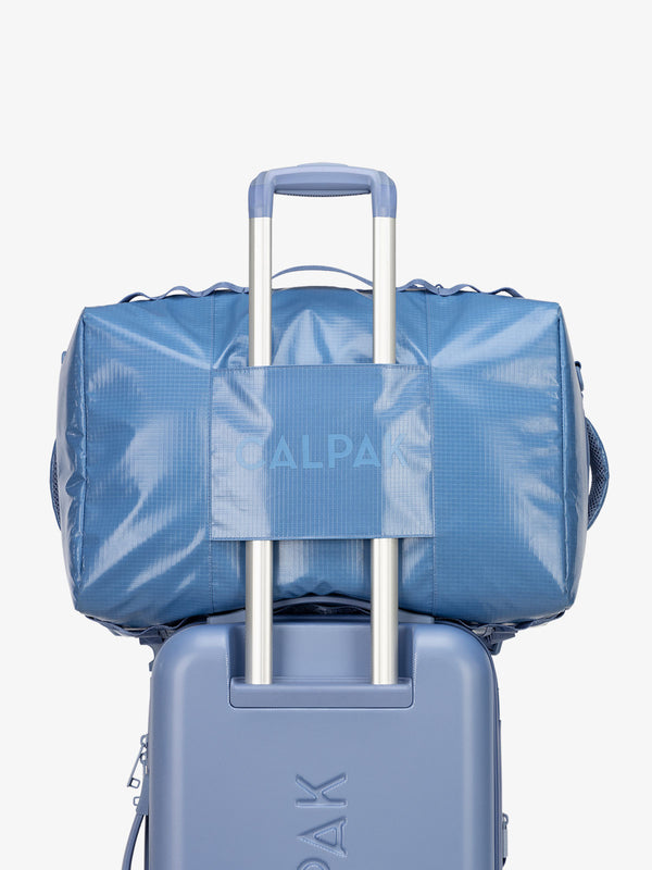 Terra Large 50L Duffel Backpack with trolley passthrough in blue glacier
