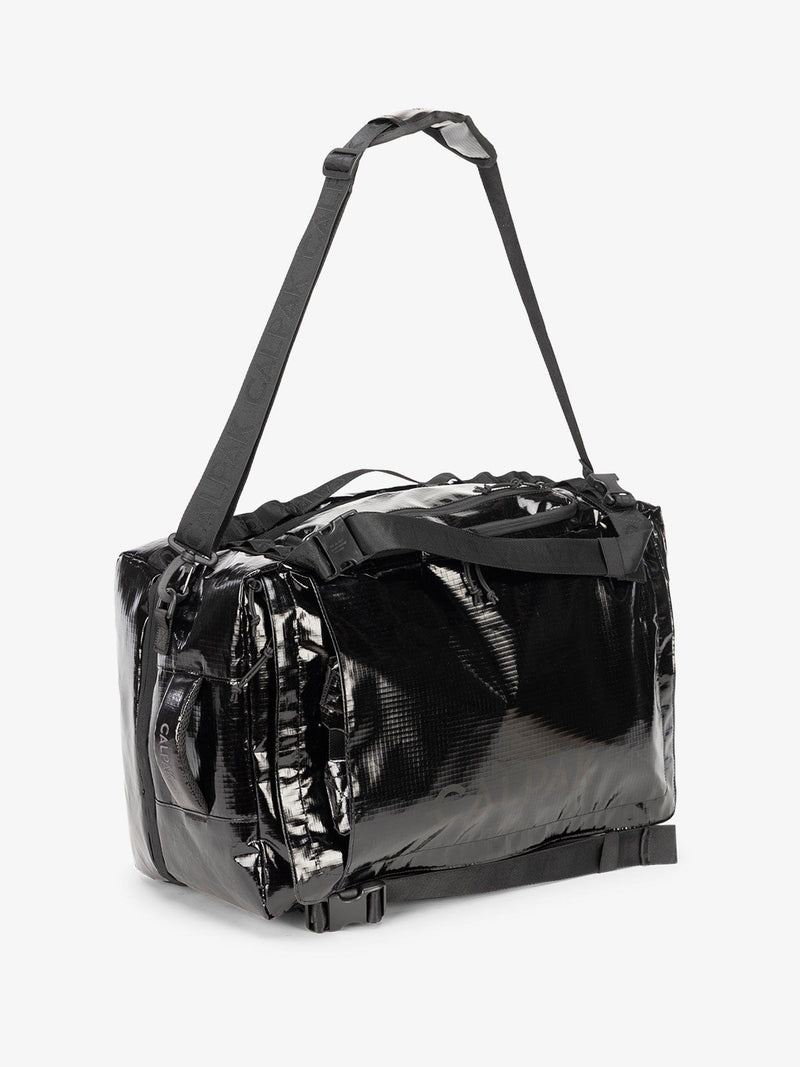 Black obsidian CALPAK terra large 50L duffel backpack with removable and adjustable body shoulder strap