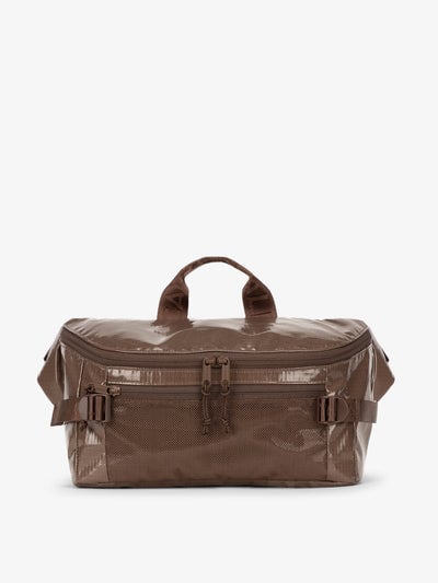 CALPAK Terra Sling Bag with mesh front pocket and top handle in brown cacao; CBH2201-CACAO
