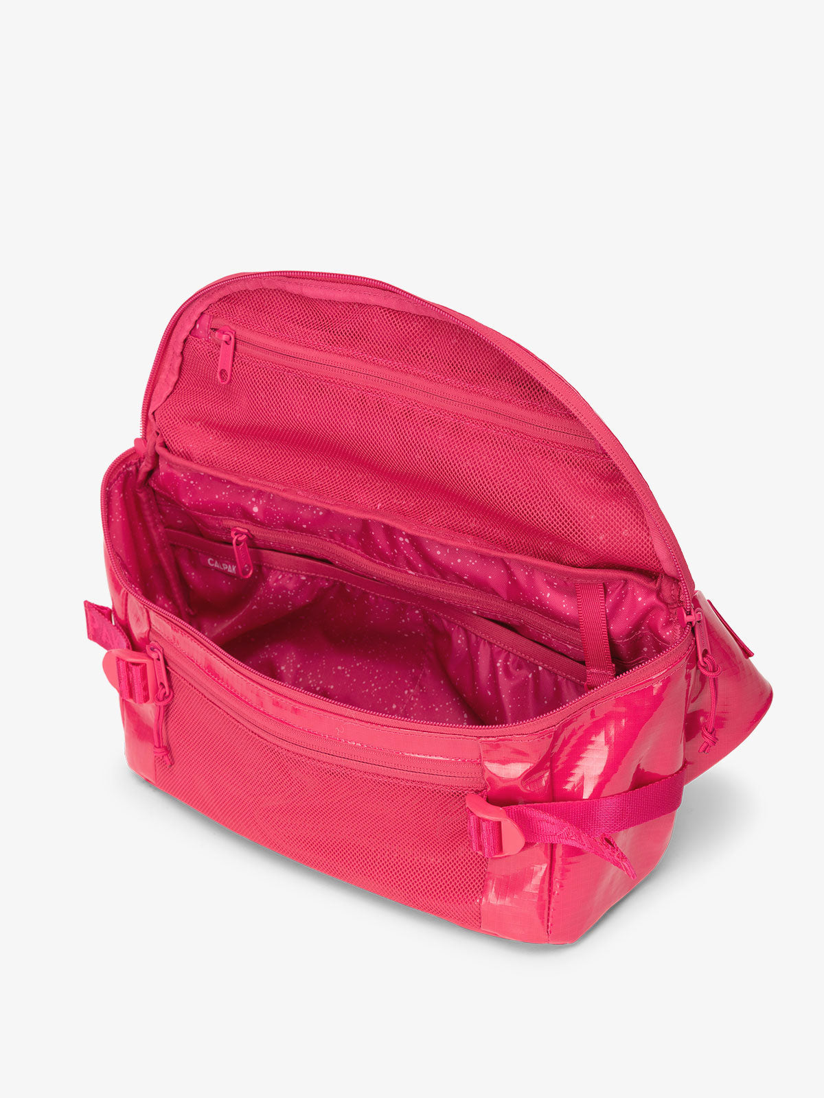 CALPAK Terra Sling Crossbody Bag for hiking with multiple pockets and adjustable straps in dragonfruit; CBH2201-DRAGONFRUIT