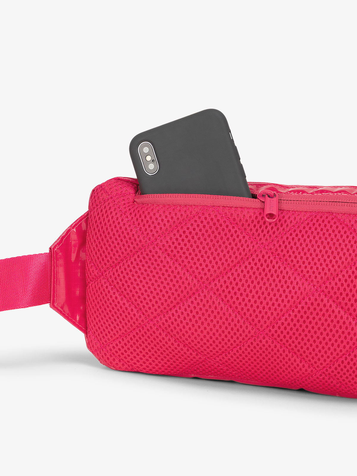 CALPAK Small crossbody sling bag with padded back and hidden zippered pocket in dragonfruit; BBT2301-DRAGONFRUIT