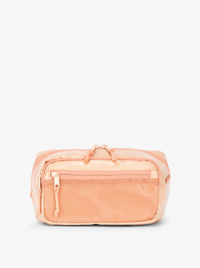CALPAK Terra small sling bag with mesh front pocket in canyon
