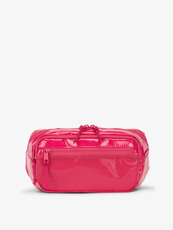 CALPAK Terra small sling bag with mesh front pocket in pink dragonfruit