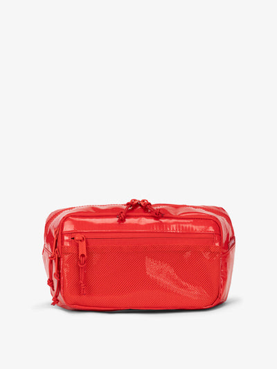 CALPAK Terra small sling bag with mesh front pocket in red flame; BBT2301-FLAME view 1