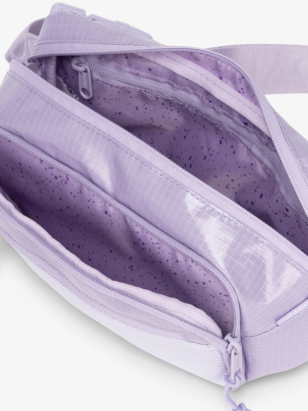 Terra hiking belt bag with multiple interior pockets and water resistant exterior in amethyst purple