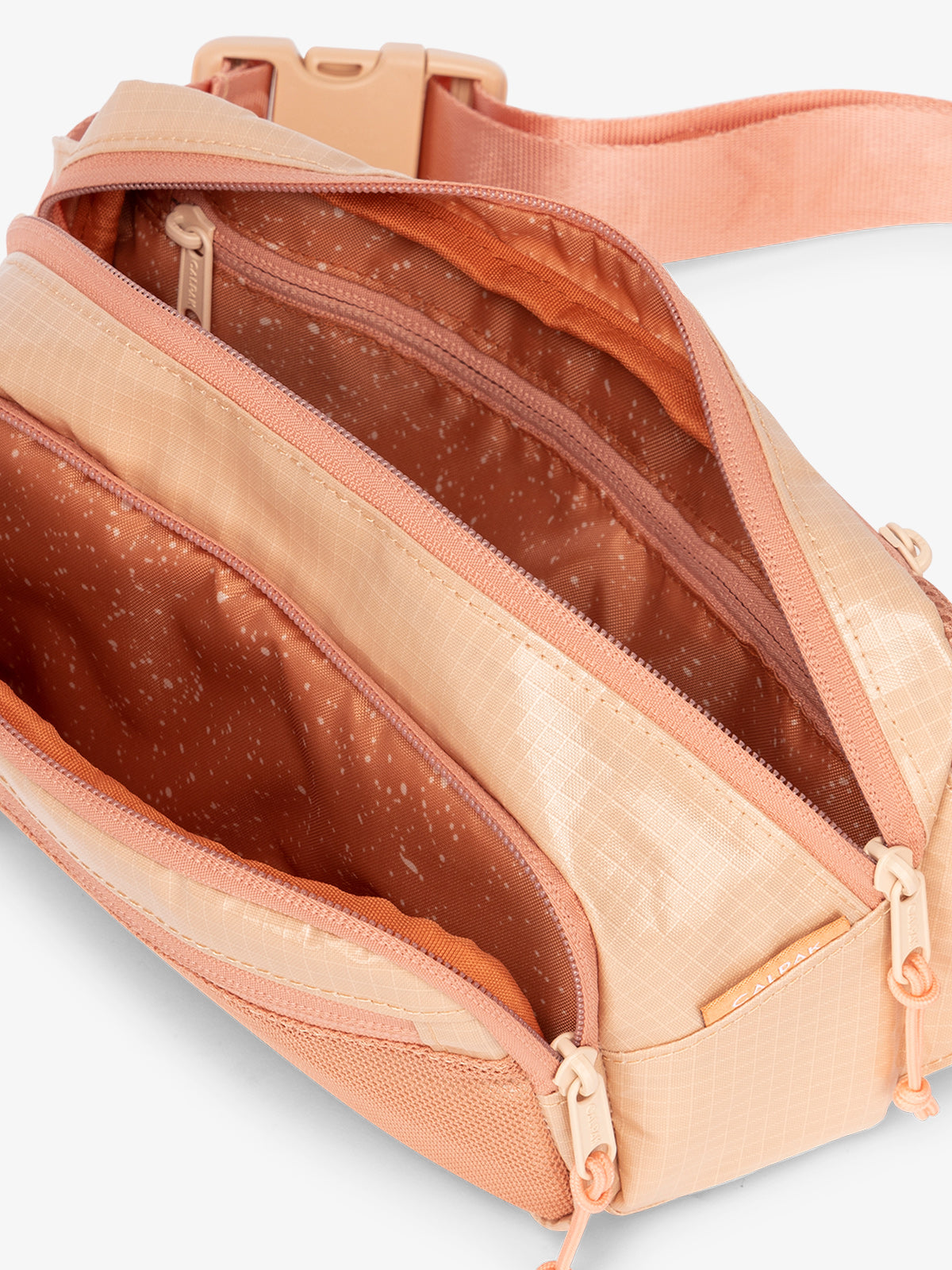 CALPAK Terra small belt bag with multiple interior pockets and water resistant exterior in canyon orange; BBT2301-CANYON