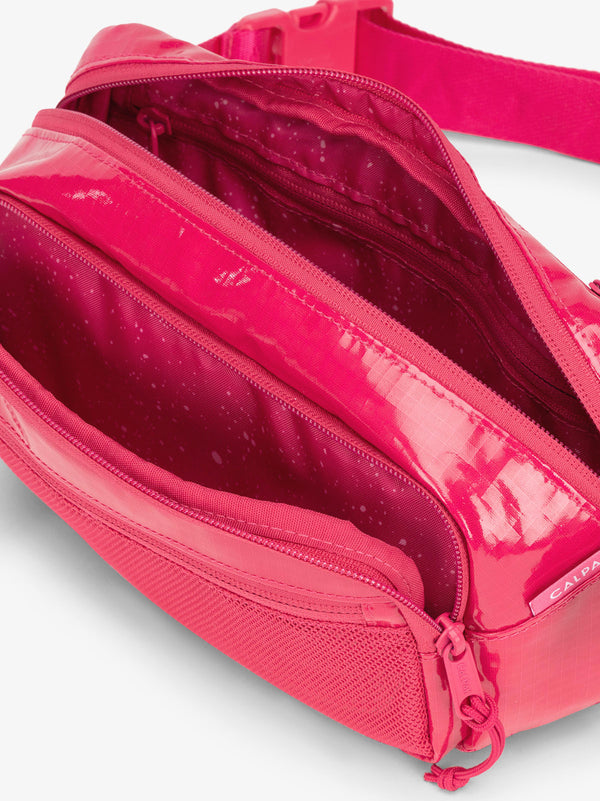 Terra hiking belt bag with multiple interior pockets and water resistant exterior in dragonfruit pink