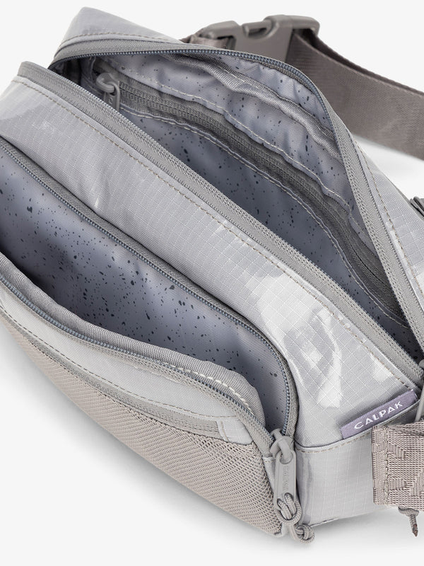Terra hiking belt bag with multiple interior pockets and water resistant exterior in storm gray