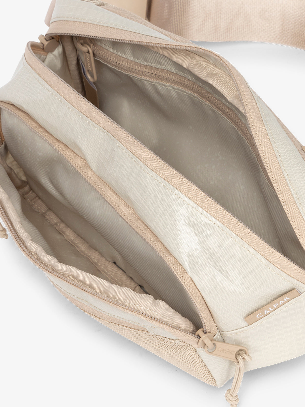 Terra small belt bag with multiple interior pockets and water resistant exterior in white sands