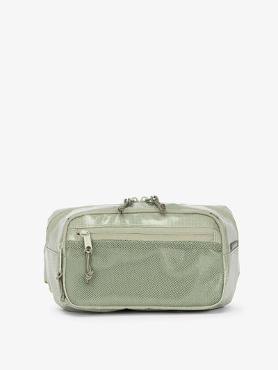 CALPAK Terra small sling bag with mesh front pocket in juniper; BBT2301-JUNIPER view 1