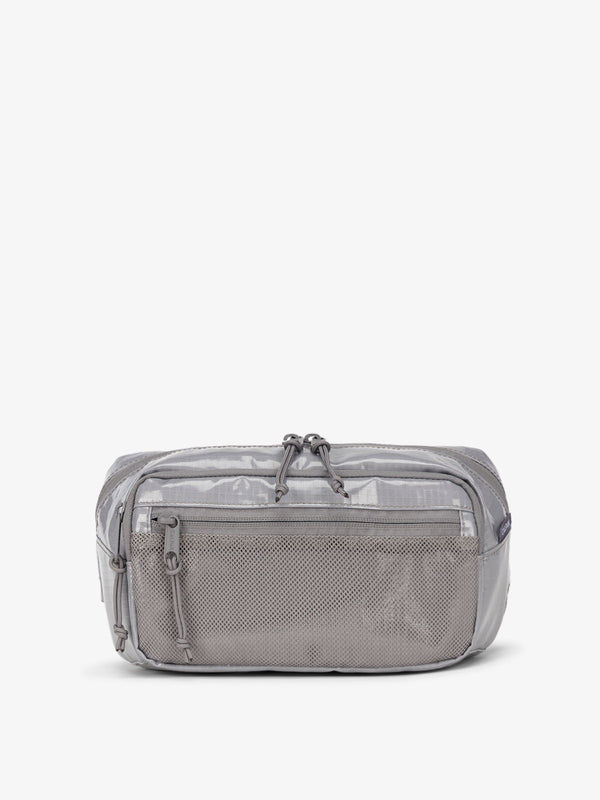 CALPAK Terra small sling bag with mesh front pocket in gray storm