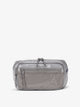 CALPAK Terra small sling bag with mesh front pocket in gray storm; BBT2301-STORM
