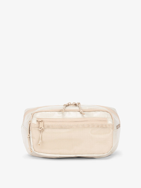 CALPAK Terra small sling bag with mesh front pocket in white sands