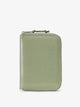 CALPAK Terra Zippered Passport Wallet front view in juniper; ATPW2501-BLOSSOM-ASPIRE