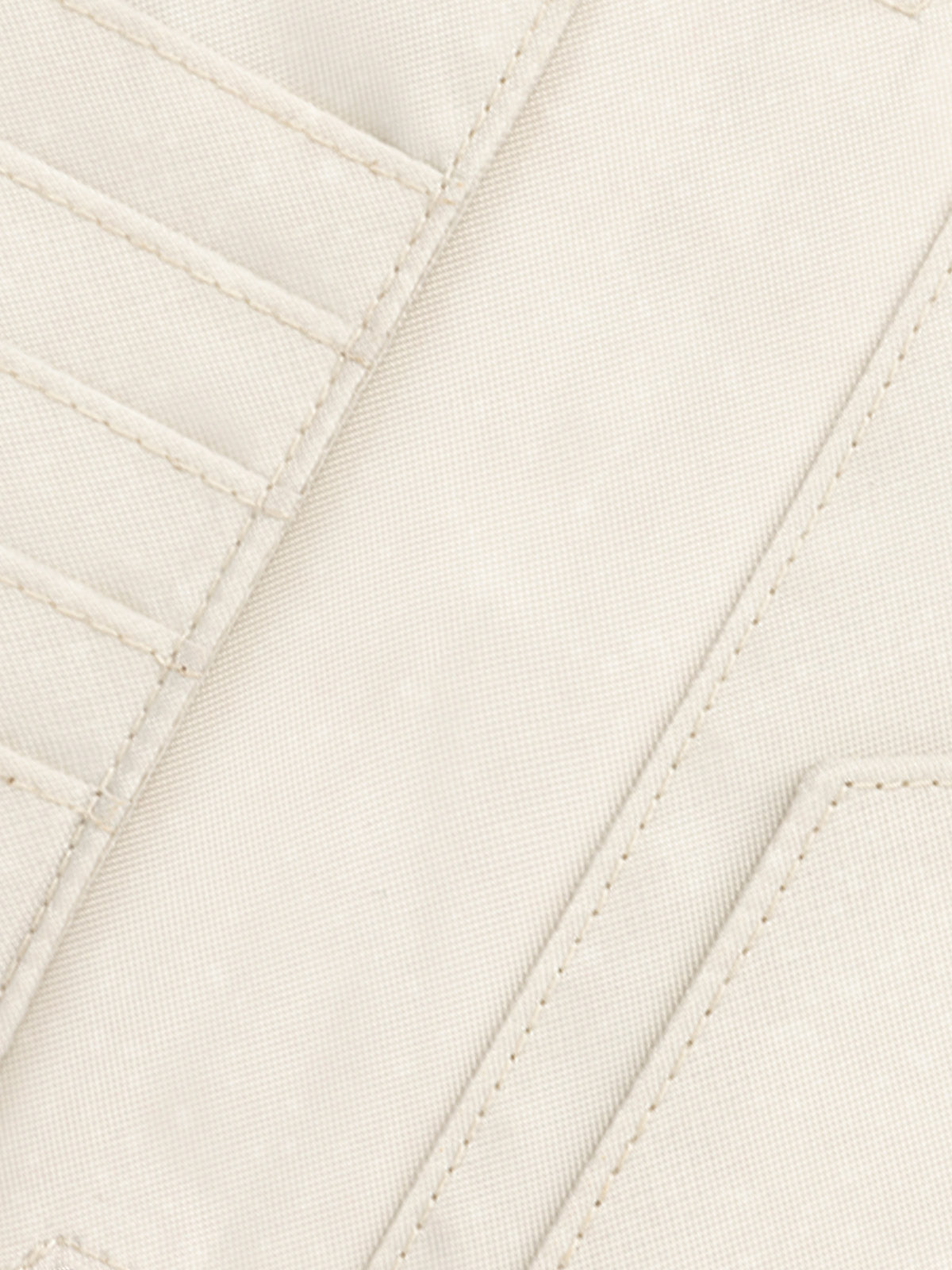 Inner lining of CALPAK Terra Zippered Passport Wallet in beige White Sands; ATPW2501-WHITE-SANDS