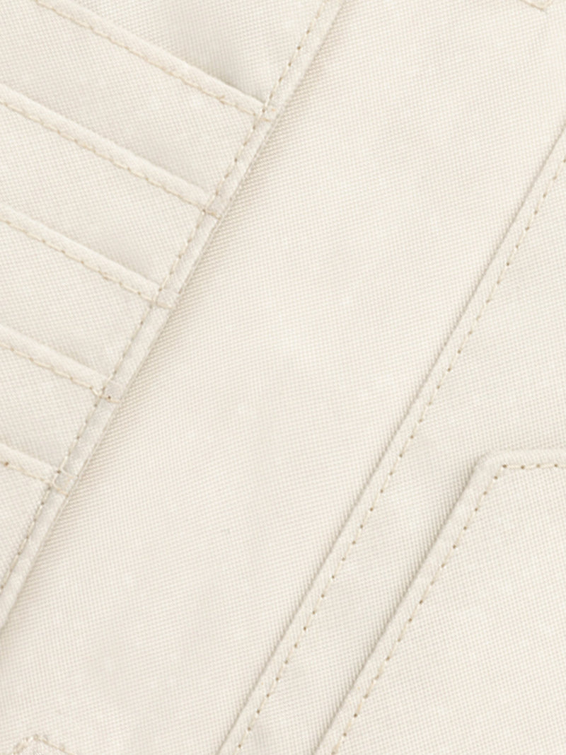 Inner lining of CALPAK Terra Zippered Passport Wallet in beige White Sands