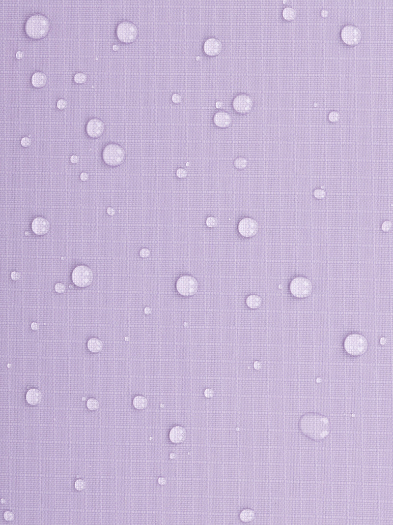 Water resistant material shown with water droplets on CALPAK Terra Zippered Passport Wallet in lavender Amethyst