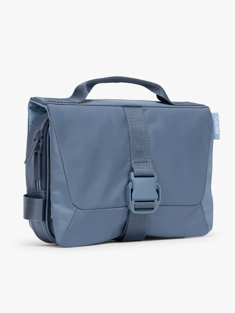 Side view of the CALPAK Fit Hanging Dopp Kit in blue Indigo