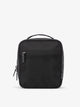 Front-view of CALPAK The Everything Cube made with durable exterior material featuring exterior mesh pocket and top handle in black; ACE2401-BLACK