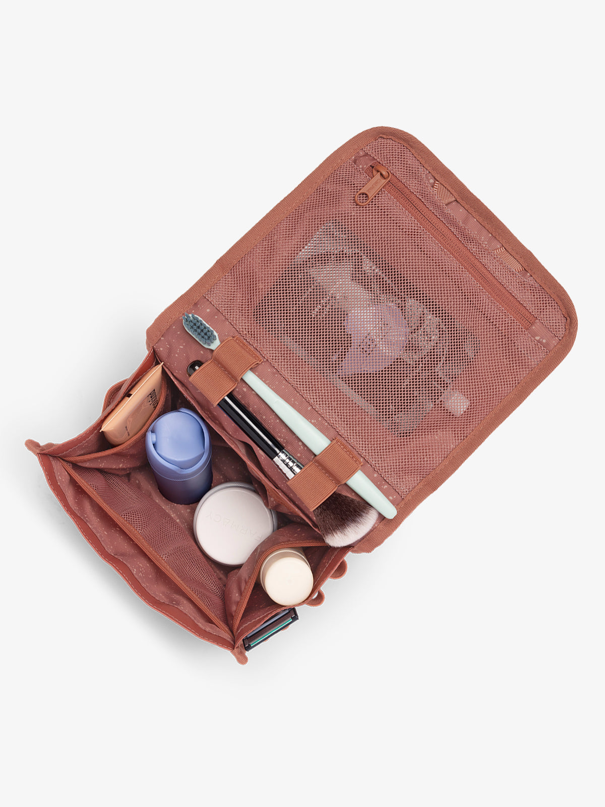 CALPAK Terra Hanging Toiletry Bag in red and orange Matte Clay open top with toiletries; THY2201-CLAY