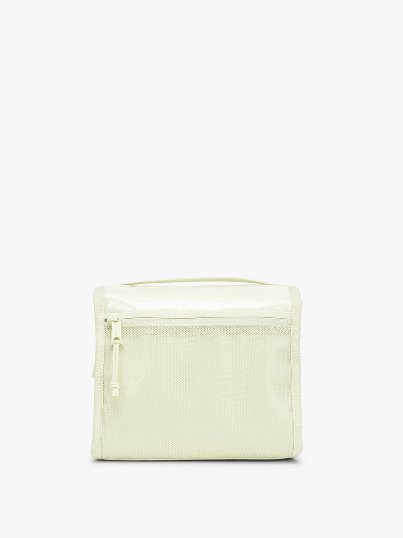 Back of CALPAK Terra Hanging Toiletry Bag in light green Celadon with front buckle