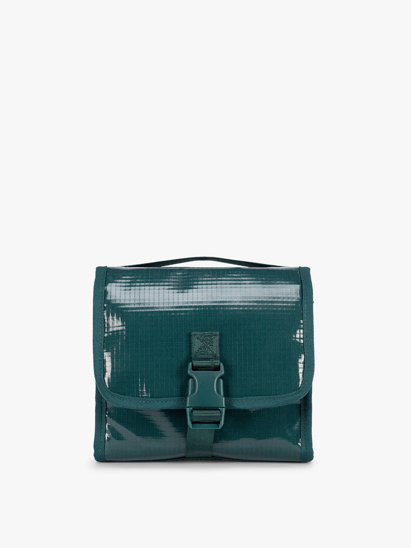 CALPAK Terra Hanging Toiletry Bag to store makeup and toiletries in blue green Kale on a white background