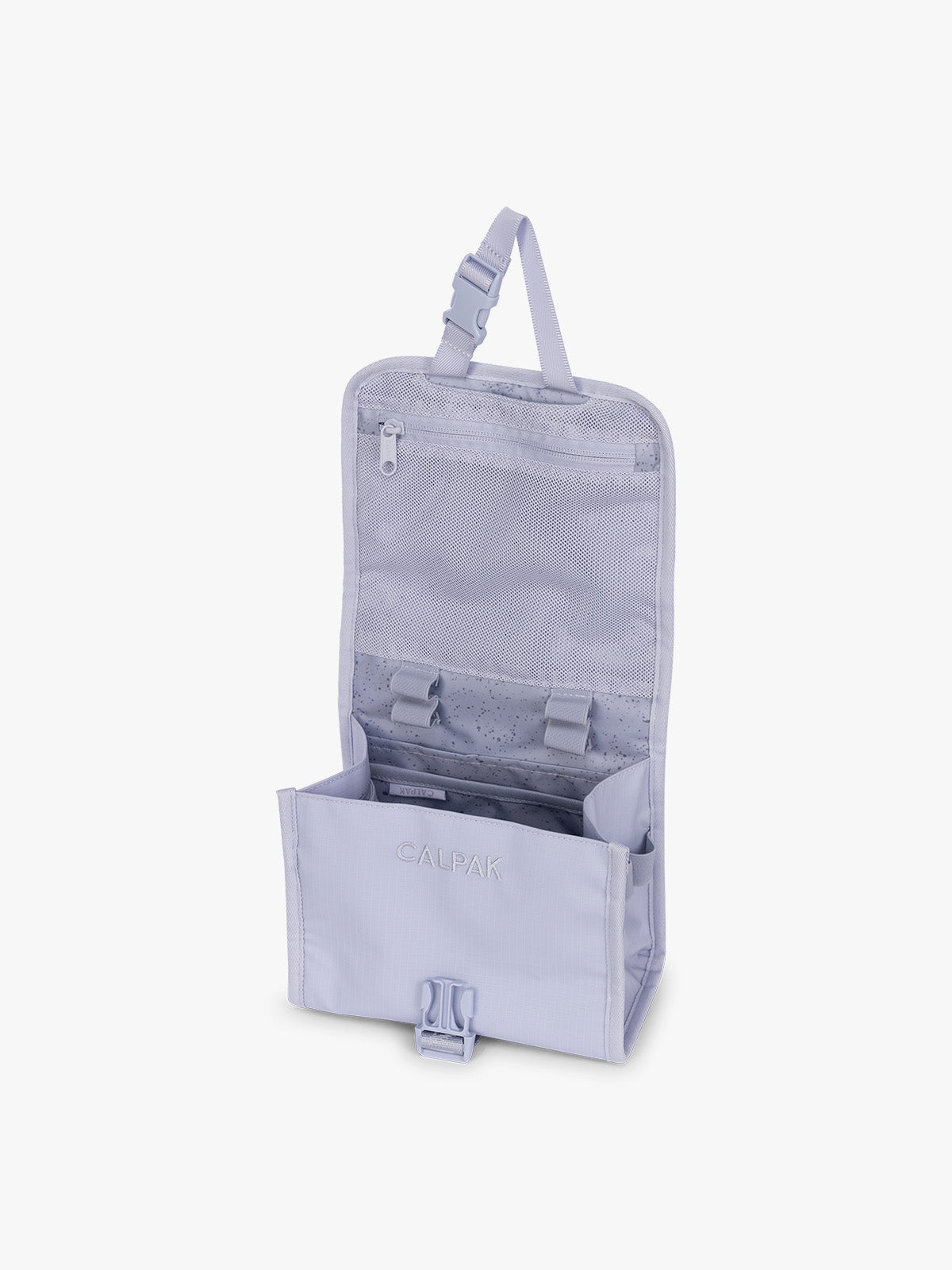 Opened CALPAK Terra Hanging Toiletry Bag in light purple Sea Glass with front buckle; THY2201-SEA-GLASS