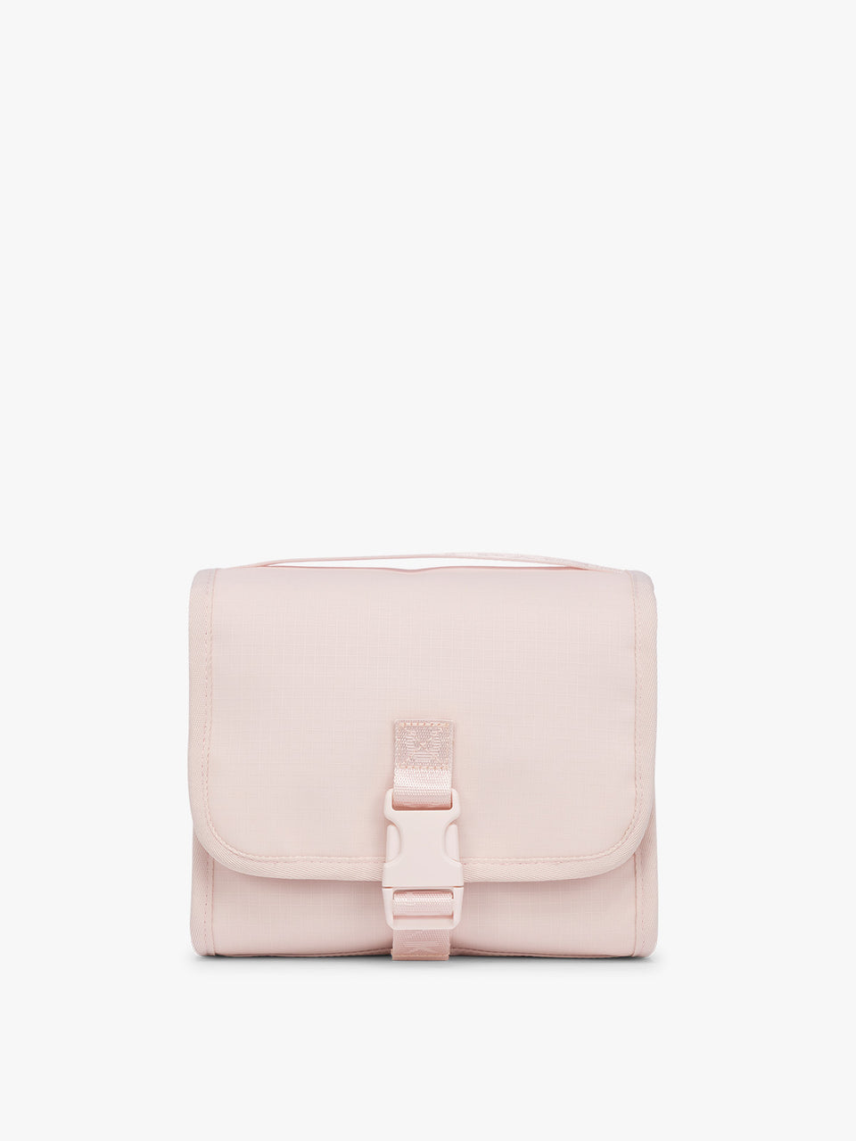 CALPAK Terra Hanging Toiletry Bag in light pink Shell Pink with front buckle; THY2201-SHELL-PINK