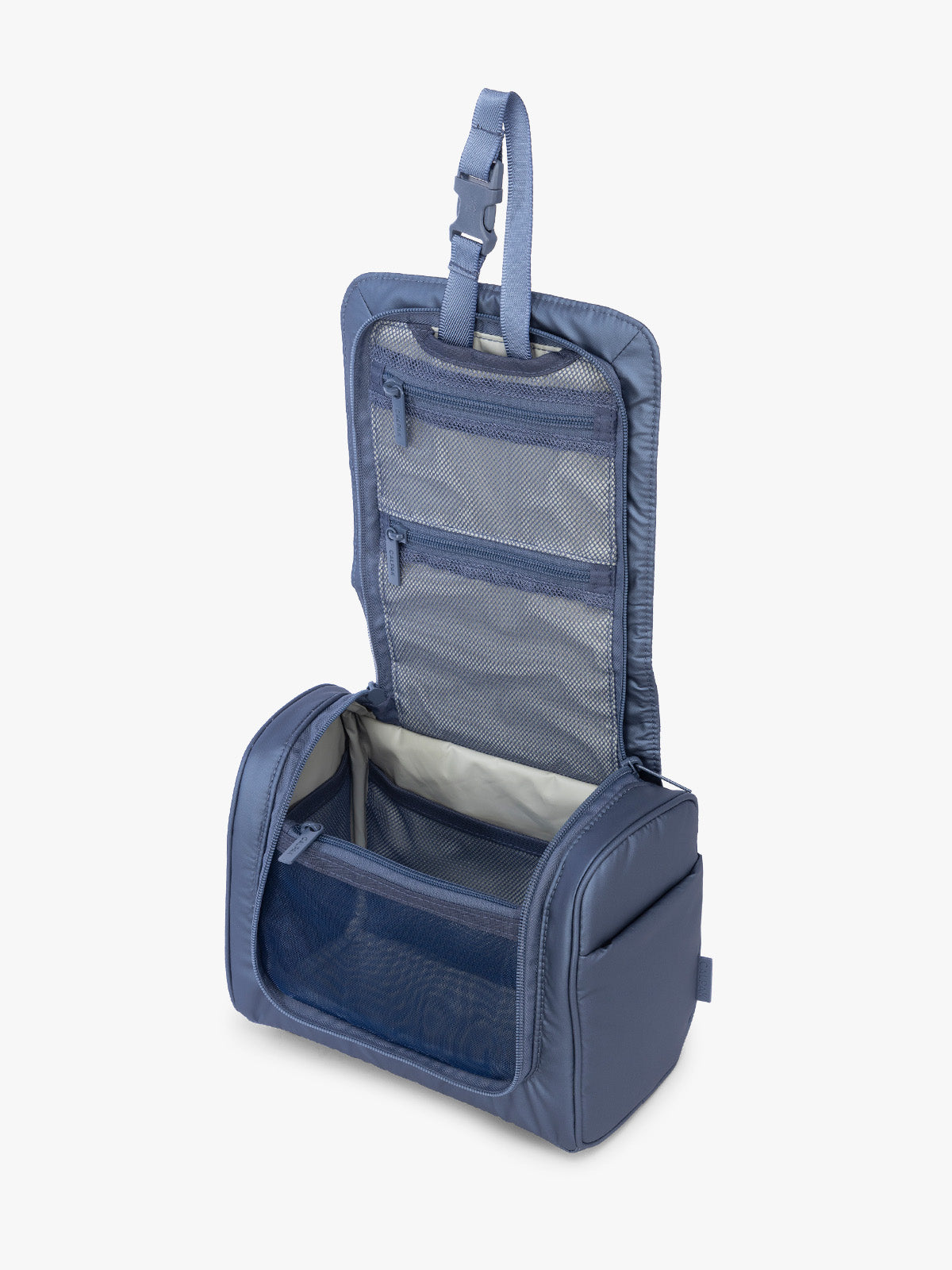 Luka Hanging Toiletry Bag in Metallic Indigo | CALPAK