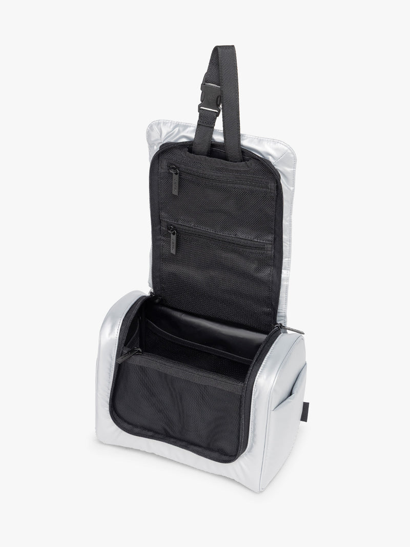 Opened CALPAK Luka Hanging Toiletry Bag in Silver