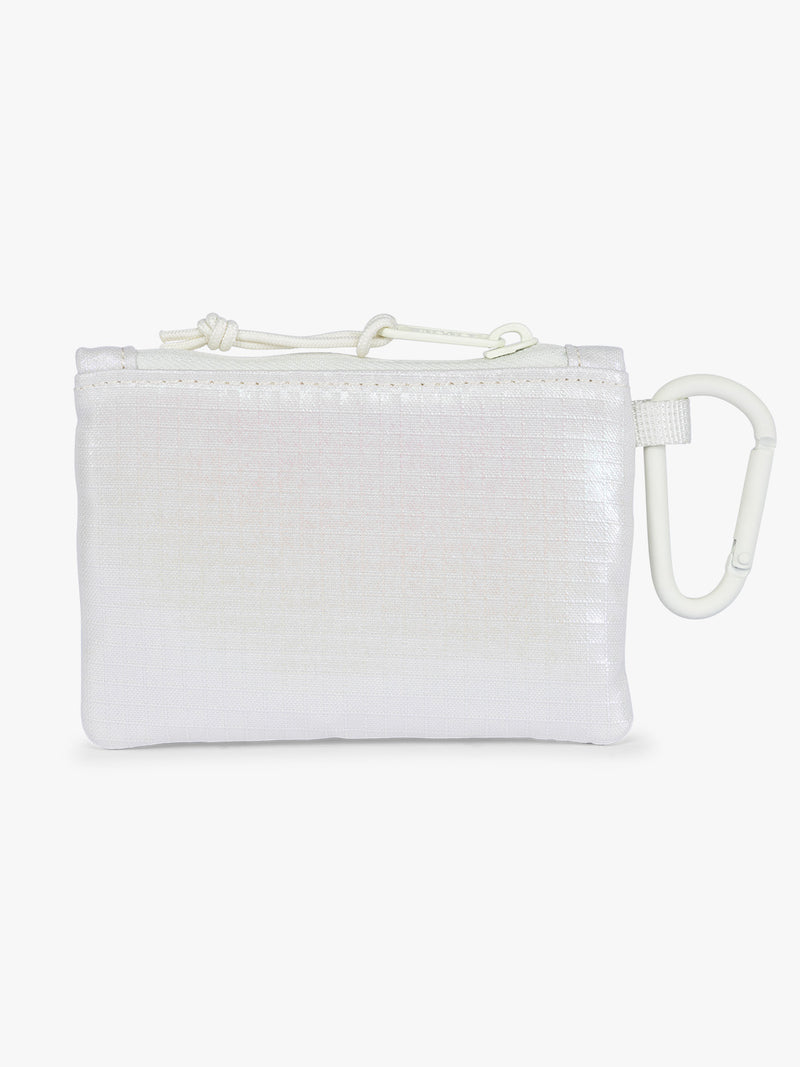 Backside of CALPAK Terra Clippable Card Pouch in shiny white Moonbeam on a white background with a carabiner