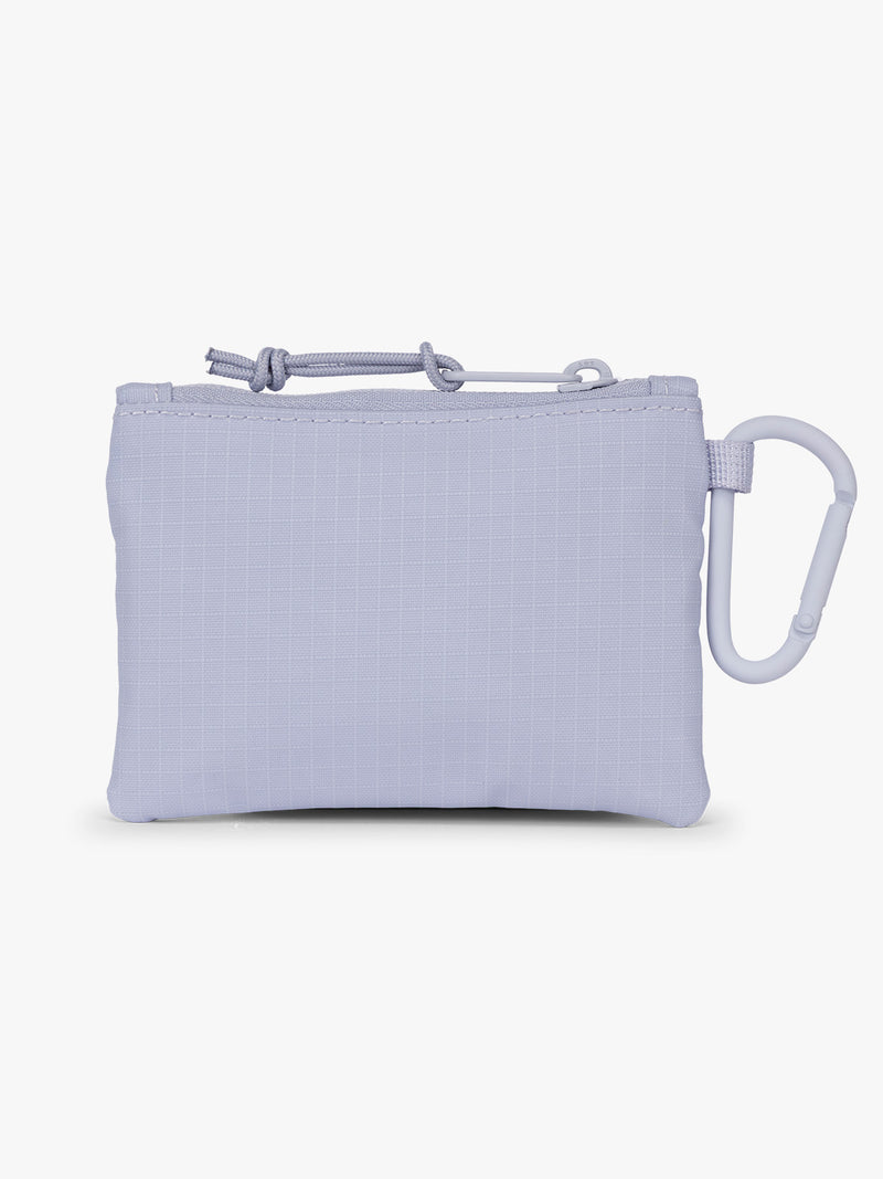 Backside of CALPAK Terra Clippable Card Pouch in light purple lavender Sea Glass on a white background with a carabiner