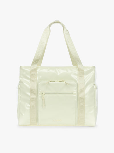 CALPAK Terra 35L Tote Bag with multiple pockets and shoulder straps in shiny light green Celadon on a white background; TTO2401-CELADON view 1