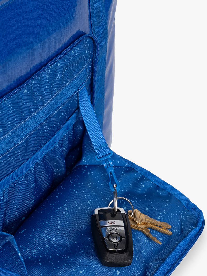 CALPAK Terra 35L Tote in blue Cobalt key tag