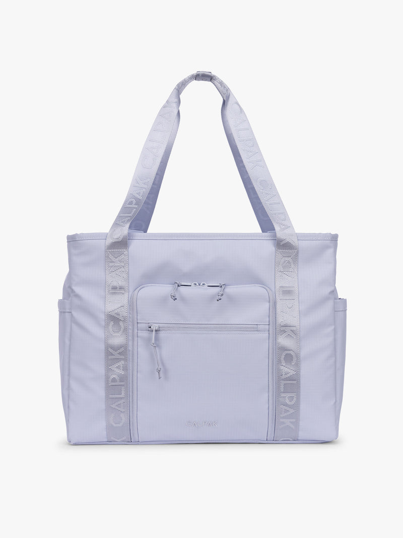CALPAK Terra 35L Tote Bag with multiple pockets and shoulder straps in shiny light lavender Sea Glass on a white background