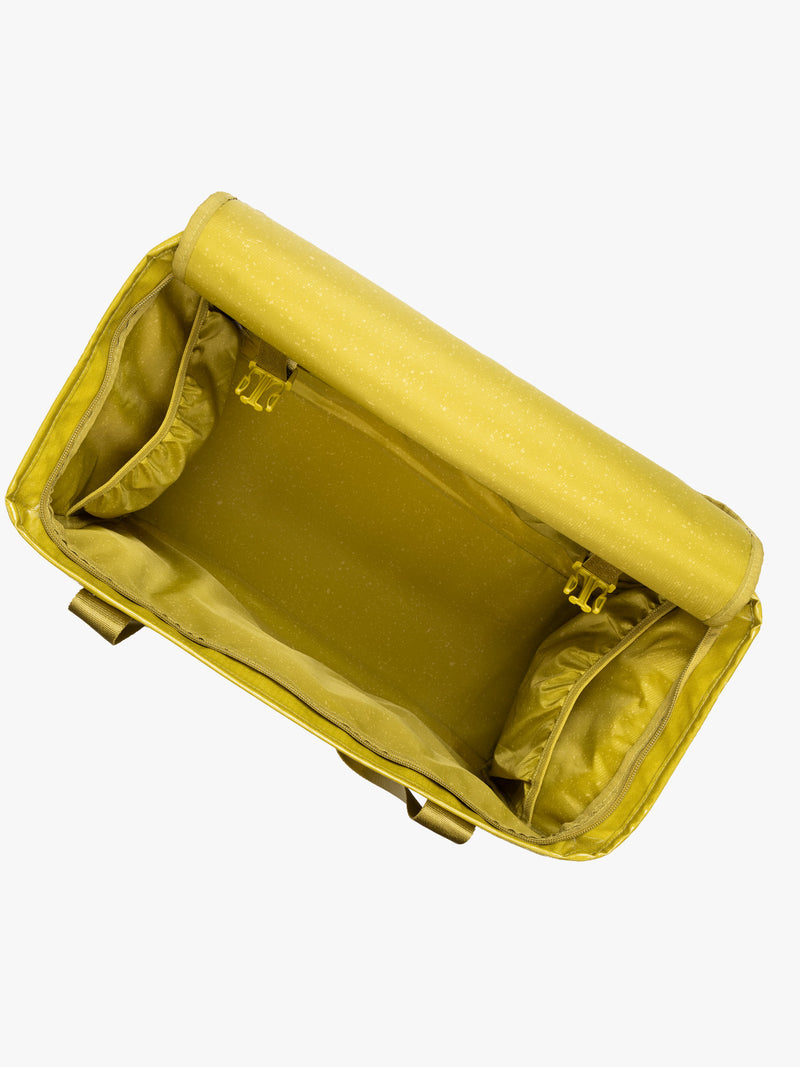 Opened CALPAK Terra 35L Tote Bag with zippers in yellow green Wasabi on a white background