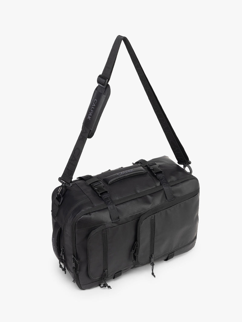 CALPAK Terra 26L Laptop Duffel Backpack in black Matte Obsidian duffel angle view