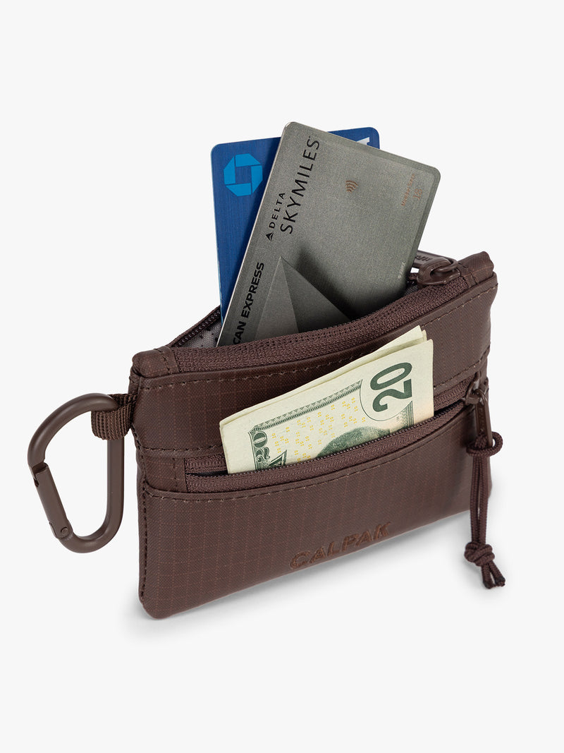 CALPAK Terra Clippable Card Pouch in brown Walnut filled with cards and cash