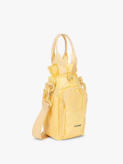 CALPAK water bottle carrier with strap in lemonade yellow; AWH2101-LEMONADE view 1