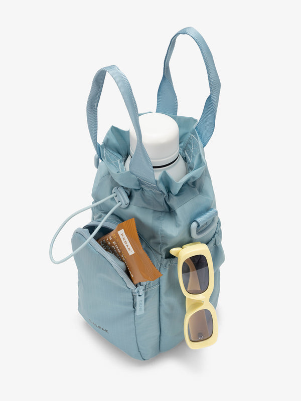 CALPAK Water Bottle carrier with zippered pocket in powder blue