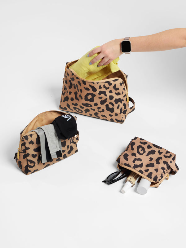 CALPAK Water Resistant Zippered Pouch Set with wide opening and convenient side loop in cheetah