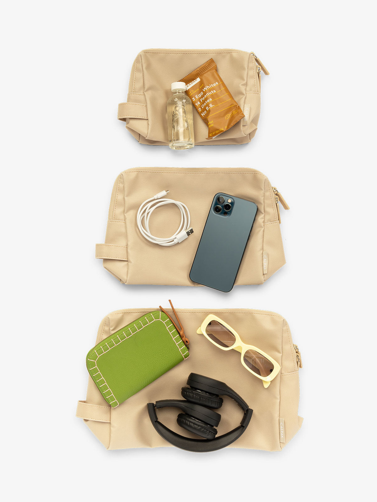 CALPAK waterproof zippered pouch set in size small, medium, and large in oatmeal; PCZP2401-OATMEAL