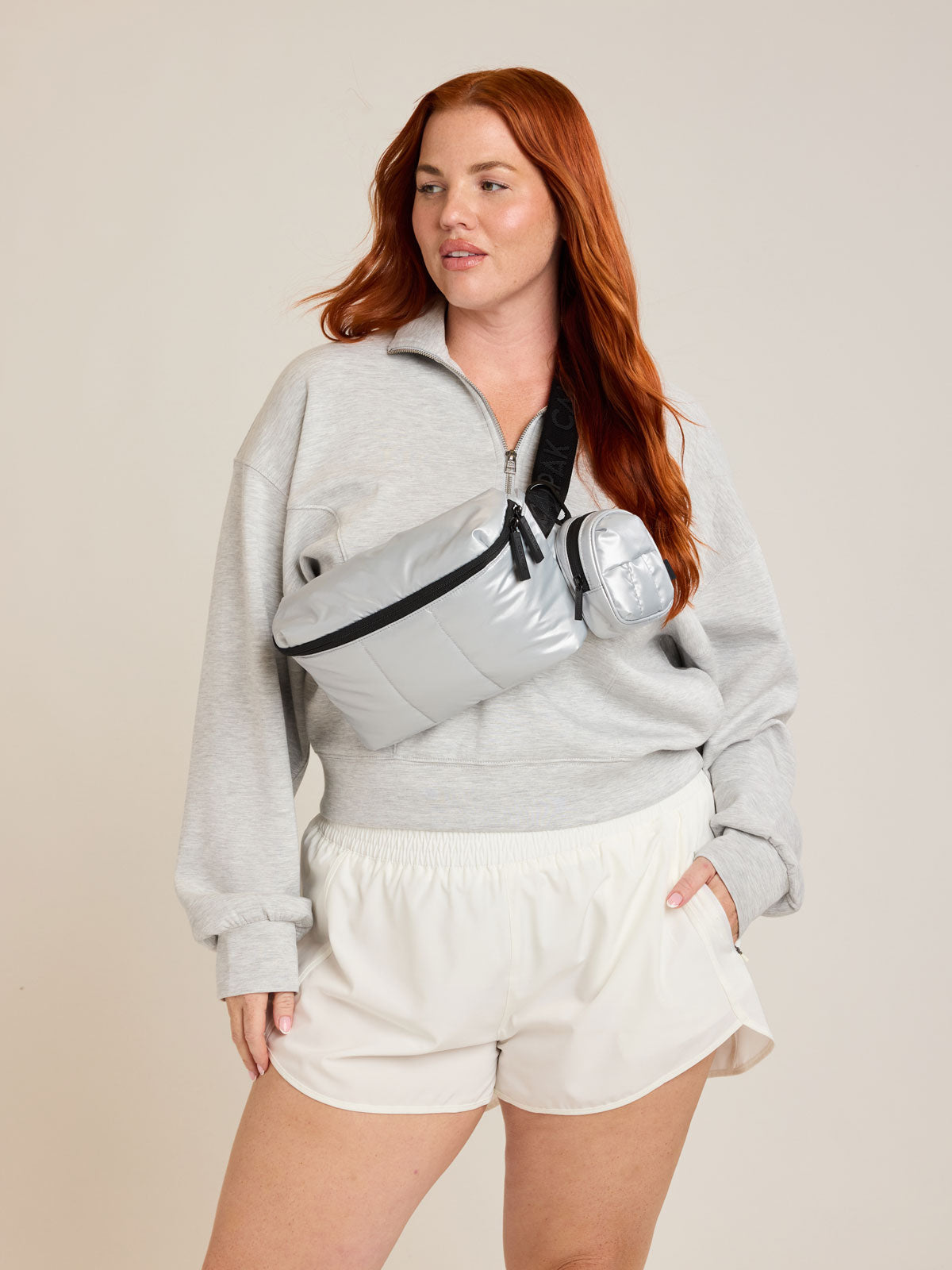 Model with CALPAK Luka Belt Bag in Silver; BB1901-SILVER