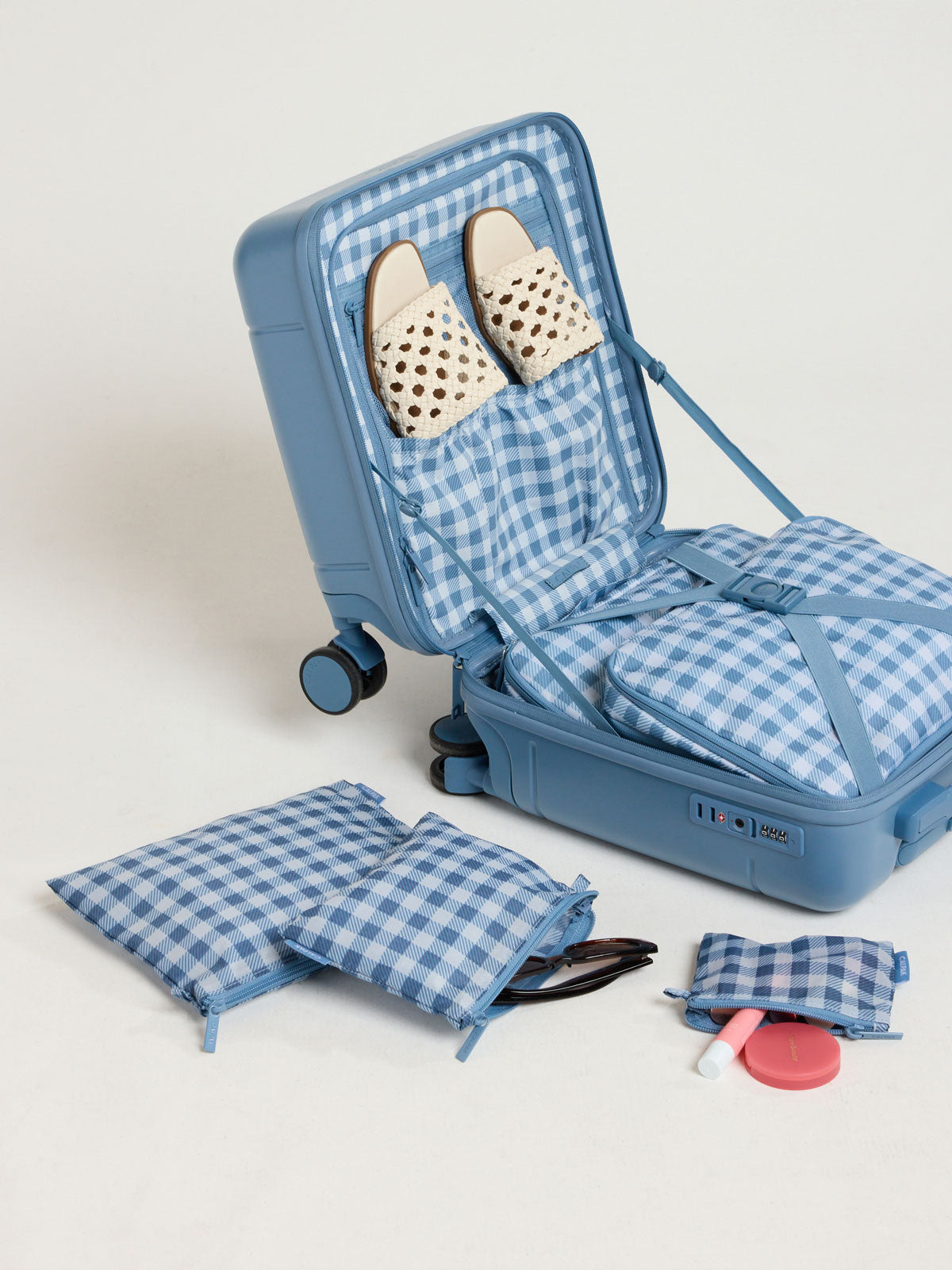 Items that can fit into the CALPAK Compakt Zip Pouch Set in white and blue gingham print French Blue Gingham; KZB2001-FRENCH-BLUE-GINGHAM