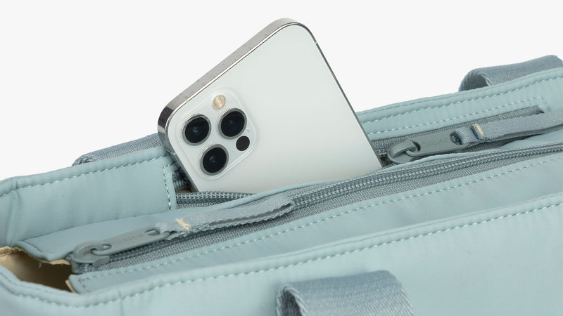 CALPAK Connect Zippered Laptop Tote in light blue Bluebell with phone zipper pocket