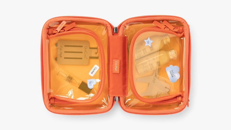 CALPAK Small Clear Cosmetics Case in orange Papaya with Dedcool collaboration products inside