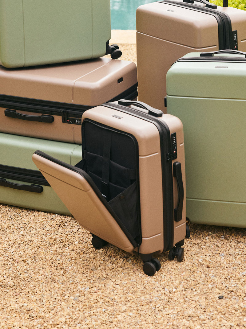 CALPAK Hue Front Pocket Carry On Luggage in brown Chocolate with other Hue Luggage