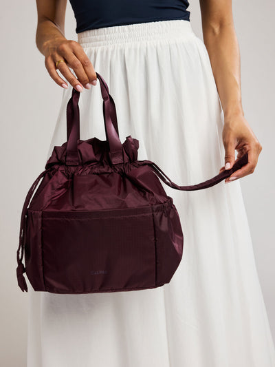 Burgundy Dark Cherry CALPAK Insulated Lunch Bag with top handles, shown against a plain white background; ALB2001-DARK-CHERRY view 2