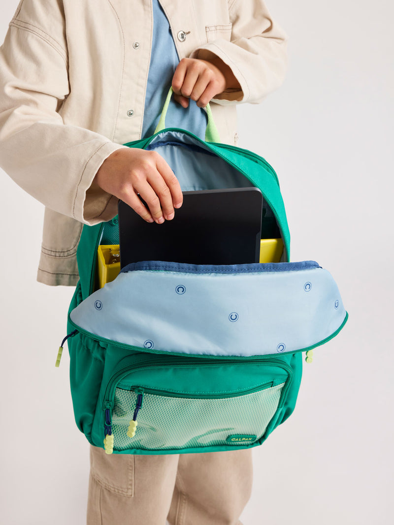 a backpack for kids Wildkin 12 Inch Toddler Kids, Trains, Planes, and Trucks | Ages 3-7, insulated front pocket coordinates with matching Wildkin nap mats and water bottles a D ring for attaching a toy Western Chief Kids Mini Shark